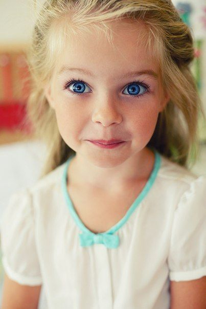 Baby With Blue Eyes In Ponytails Blue Eyes Baby Pictures Baby