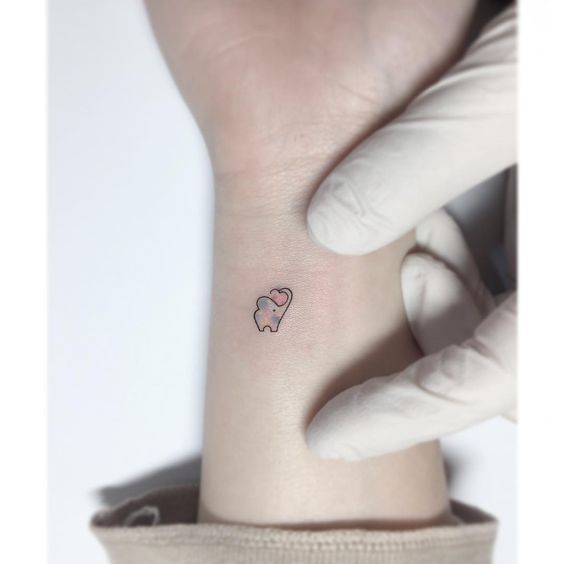 Minimalist Tiny Bear Tattoo