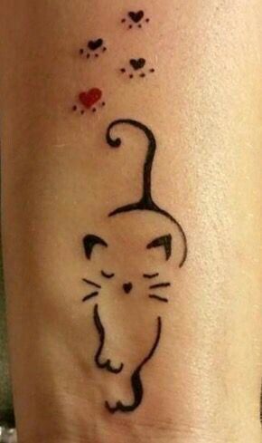 minimalist cat tattoo tiny