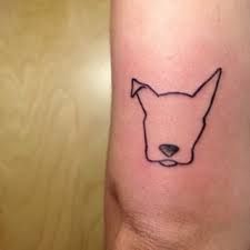 dog head outline tattoo