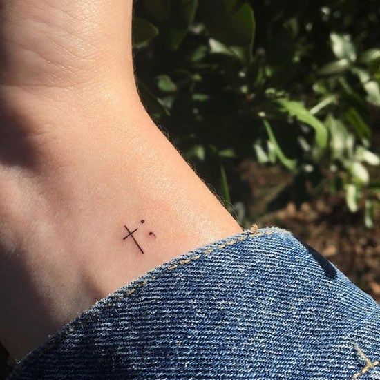 dainty cross tattoos