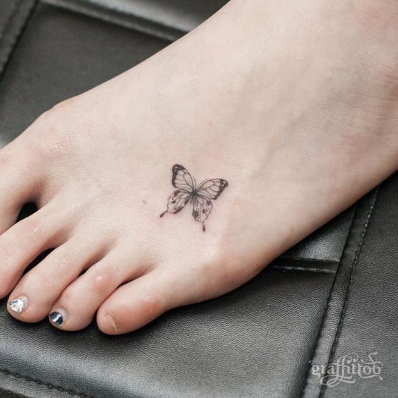 Alluring Butterfly Tattoo on Foot - Butterfly Simple Tattoos - Simple Tattoos - MomCanvas