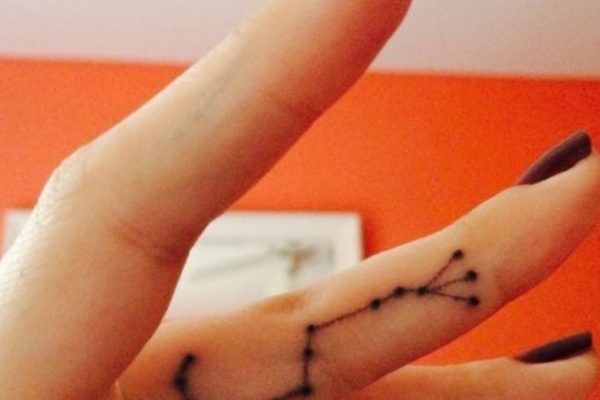 Black Silhouette Eiffel Tower Tattoo On Wrist