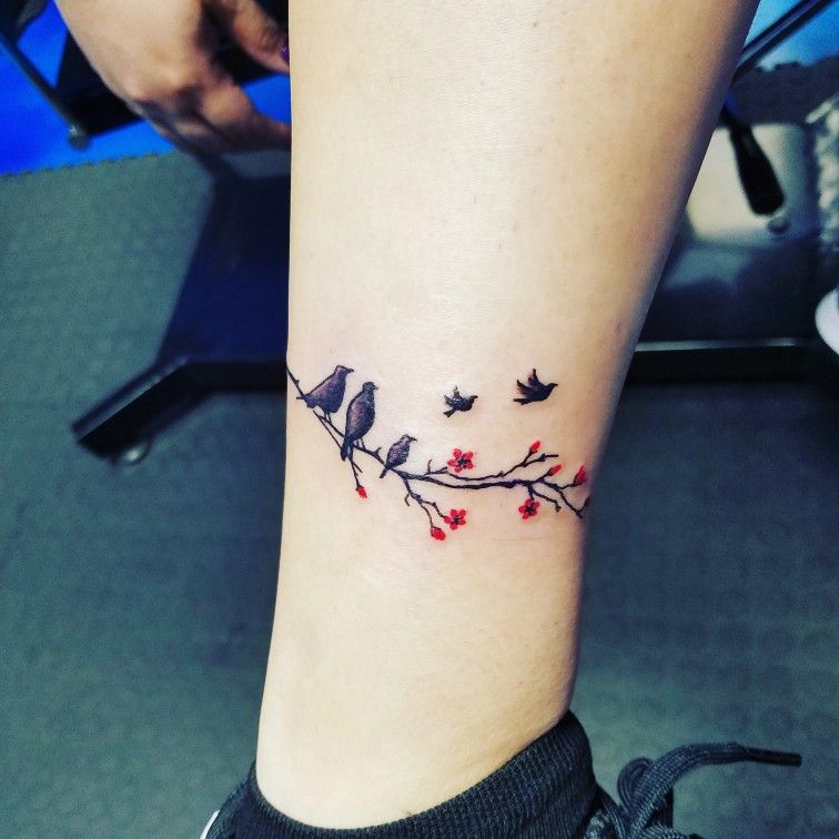 My first big tattoo dedicated to my family those three birds represent me  and my siblings and feather represent the love and care by mom dad Done by  Pablo at New edge