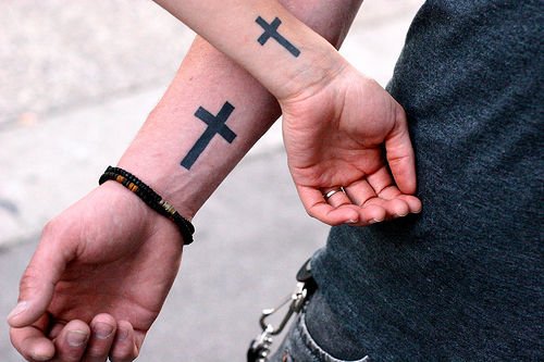 My first tattoo lol I know its really nothing just a quick simple small 2  line cross on my wrist lol  rTattooDesigns