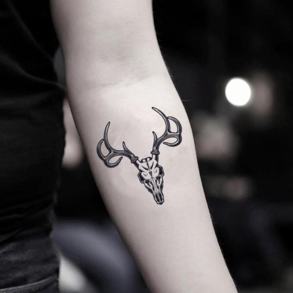 Deer tattoo on the inner forearm inspired in several
