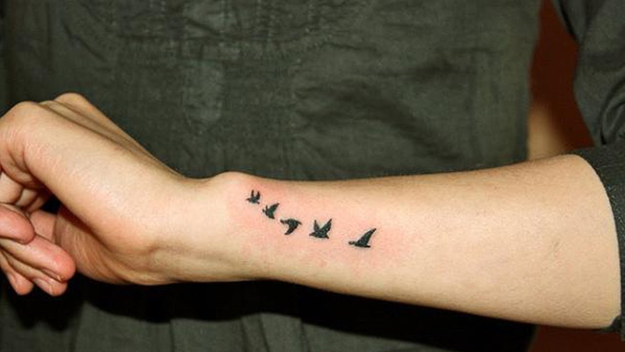 Amazing Small Bird Tattoo on Arm - Small Bird Tattoos - Small Tattoos -  MomCanvas